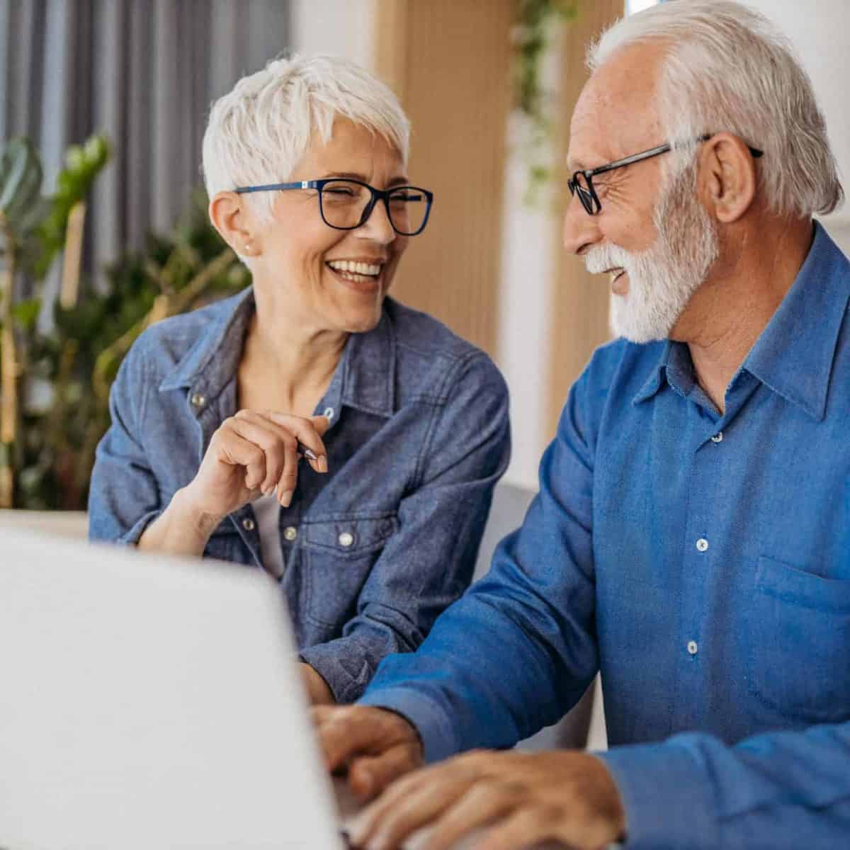 Florida Precious Metals IRA & Investing Company Copy of Senior couple at laptop smiling GettyImages 1323096524 1200x1200 1